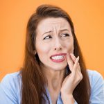 Gum Disease (Gingivitis & Periodontitis): Symptoms, Causes and Treatment